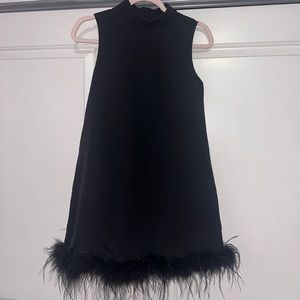 Black high neck mini dress with feather boa hem size S